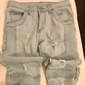 Soft blue, distressed cotton jeans. Brand new